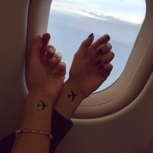 airplanes - Best Friend Tattoos for Females: Celebrating Friendship with Ink
